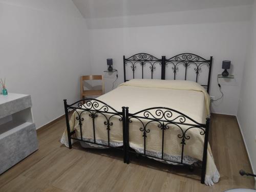 Letto o letti in una camera di Dimora Santa Chiara