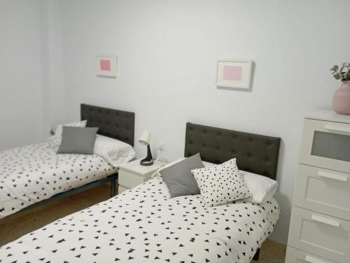 Posteľ alebo postele v izbe v ubytovaní casa EDEN