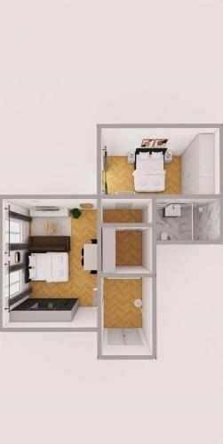 a floor plan of a room with a kitchen at Petrin Tower Residence in Prague