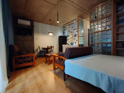 Postel nebo postele na pokoji v ubytování Davka Apartments