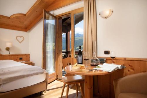 Postel nebo postele na pokoji v ubytování Hotel Galli