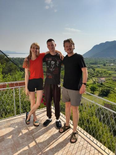a group of three people standing on top of a tower at Farm house Godinje in Godinje