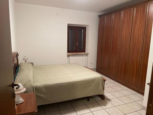 Ένα ή περισσότερα κρεβάτια σε δωμάτιο στο Casale nella valle