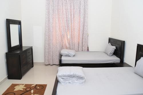 Cama o camas de una habitación en Red-37 - Bn Breek Villa