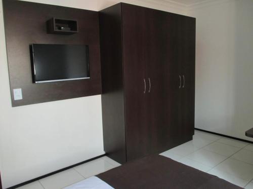 TV a/nebo společenská místnost v ubytování SP Hotel e Pousada Fortaleza