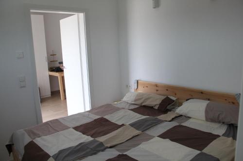 Ένα ή περισσότερα κρεβάτια σε δωμάτιο στο 2 Zimmer Wohnung 5 km vom Bodensee entfernt ab 5 Nächte