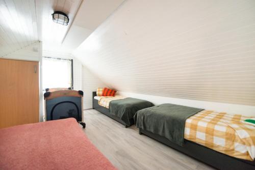 Ein Bett oder Betten in einem Zimmer der Unterkunft Boho House 2 camp Terme Catez with promotional tickets prices