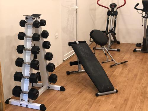 a room with a bunch of gym equipment at Eleftheria Hotel in Agia Marina Nea Kydonias