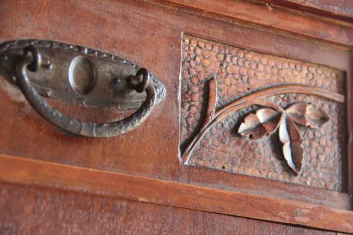 a close up of a wooden drawer with a handle at Agriturismo Ponterosa in Morrovalle
