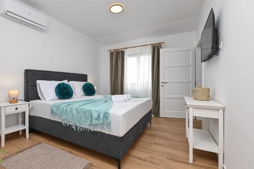 Postel nebo postele na pokoji v ubytování Villa Nika
