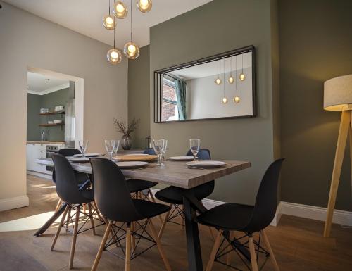 a dining room with a table and chairs at Hill View in Great Ayton in Great Ayton