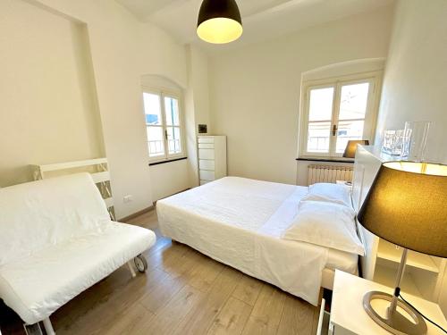 En eller flere senge i et værelse på Maison Mazzini48