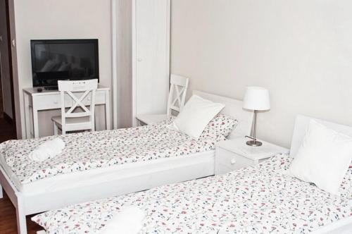 Postel nebo postele na pokoji v ubytování Pokoje Gościnne Ruciane-Nida