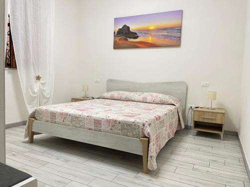Tempat tidur dalam kamar di Villa Berenice