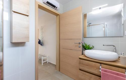 Et badeværelse på NINA ROSE boutique villa