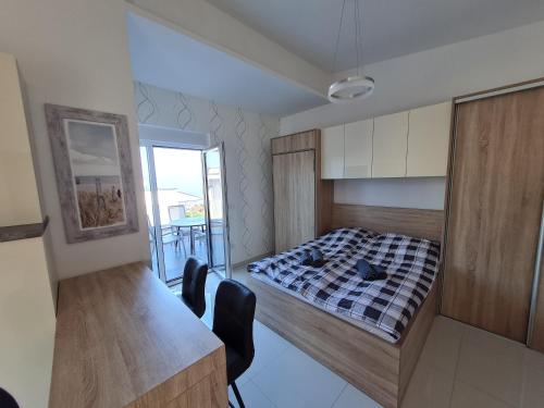 Posteľ alebo postele v izbe v ubytovaní My Paradies - Njivice Studio****