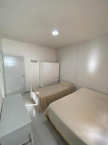 Habitación con 2 camas en una habitación en Departamento Pia en San Rafael