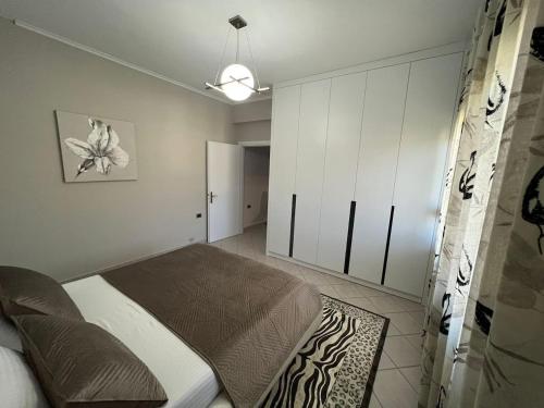 Кровать или кровати в номере Manga Luxury Apartments