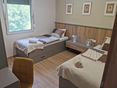 Ένα ή περισσότερα κρεβάτια σε δωμάτιο στο Apartma Bella Nadiža
