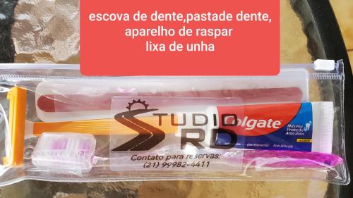 a refrigerator filled with toothbrushes and toothpaste at StudioRD Copacabana 250m da praia esquina com a Rua do Copacabana Palace Rodolfo Dantas in Rio de Janeiro