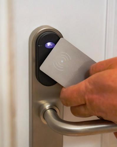 a person unlocking a door with a key at 19 Tile Ceramic Concept - by Unlock Hotels in Caldas da Rainha