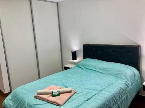 Letto o letti in una camera di 5-Súper Dpto en Morón centro