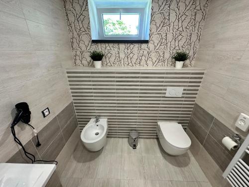 Un baño de Apartmány KŘENOV