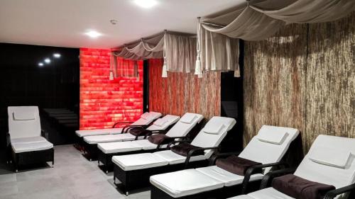 a row of chairs in a waiting room at LUXURY Apartment Hrebienok D210 in Smokovce