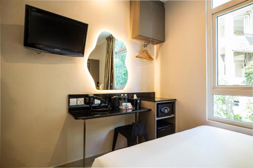 Η κουζίνα ή μικρή κουζίνα στο Fragrance Hotel - Oasis