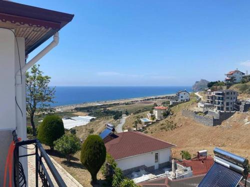 a view of the ocean from the balcony of a house at Turkish riviera sea view detached villa in Gazipasa