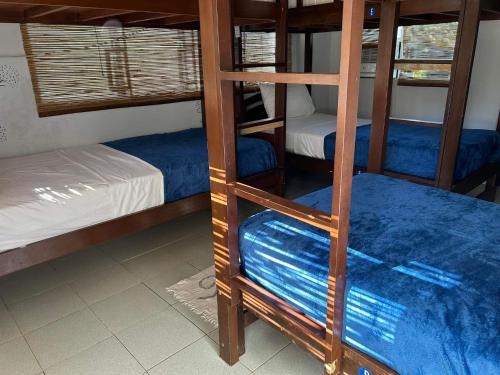 a bunk bed room with two bunk beds in it at My Hostel Boracay in Boracay