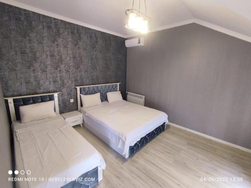Ένα ή περισσότερα κρεβάτια σε δωμάτιο στο Vendam VSL new villa