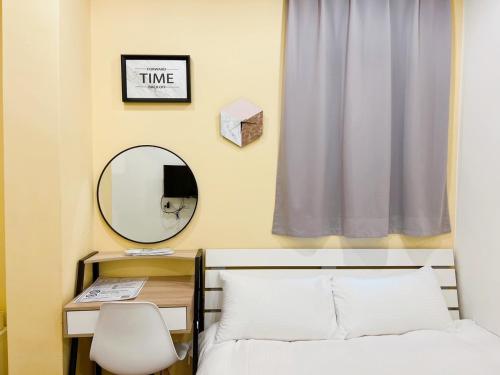 Katil atau katil-katil dalam bilik di 淡水民宿-台北Yes Hotel