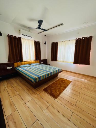 Ένα ή περισσότερα κρεβάτια σε δωμάτιο στο Shyam Sudha Home Stay