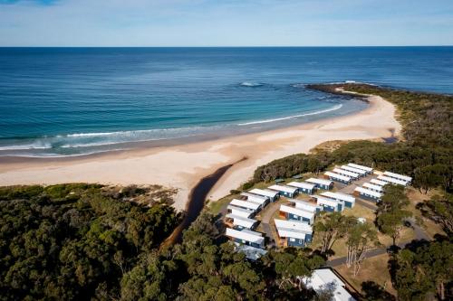 an aerial view of the beach and the ocean at BIG4 Tasman Holiday Parks - Racecourse Beach in Bawley Point
