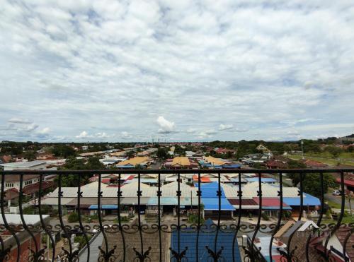 a view of a parking lot from a balcony at Mciti Suites by Evernent in Miri