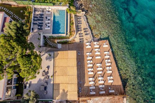 an overhead view of a building next to the water at İsolina Bodrum in Bodrum City