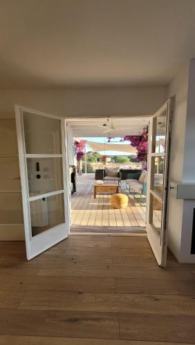 an open door to a room with a living room at CASA MAGALI in Sant Francesc Xavier