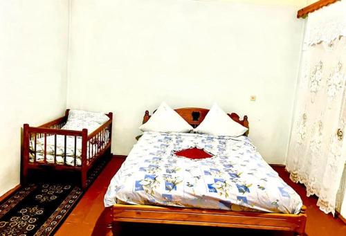 Un ou plusieurs lits dans un hébergement de l'établissement Ismayilli Bag Evi, Vacation Home