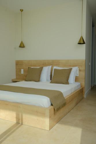 Katil atau katil-katil dalam bilik di Kaktus Suites