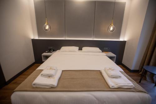 Voodi või voodid majutusasutuse SANTANA OTEL toas