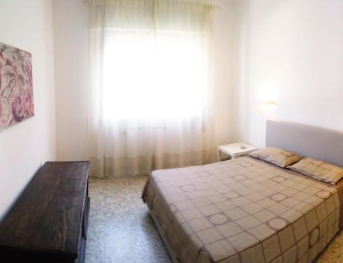 Residenza Alice - Toscana mare e monti tesisinde bir odada yatak veya yataklar