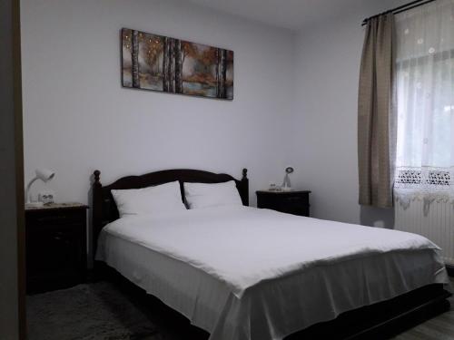 Cama o camas de una habitación en Pensiunea Cosalina Grande