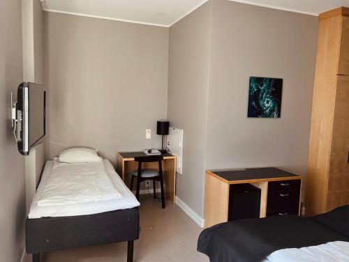 Postel nebo postele na pokoji v ubytování Zefyr Hotel