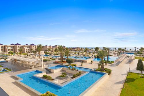 vista aerea sulla piscina di un resort di Pickalbatros White Beach Taghazout - Adults Friendly 16 Years Plus - All Inclusive a Taghazout