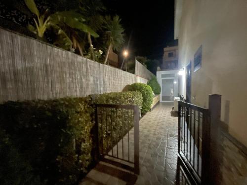 a stairway leading to a building at night at Villa Rea comfort e relax in Carlentini