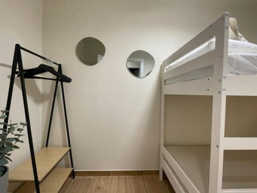 Ένα ή περισσότερα κρεβάτια σε δωμάτιο στο Superflat near beach 15' center