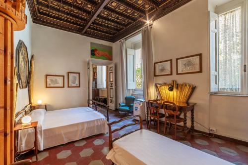 GuestHost - Pantheon Apartment - L'angolo nascosto dei quadri