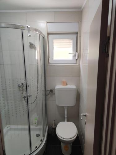 Koupelna v ubytování Studio apartman Tombo