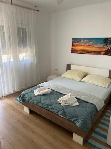 Postel nebo postele na pokoji v ubytování Petra